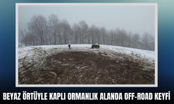 Beyaz örtüyle kaplı ormanlık alanda Off-Road keyfi