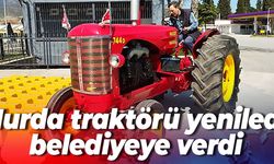 Hurda traktörü yeniledi, belediyeye verdi