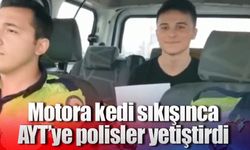Motora kedi sıkışınca, sınava polisler yetiştirdi