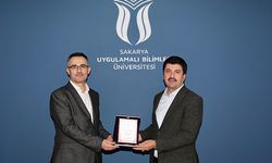 Rektör Sarıbıyık'tan Çağlar'a tebrik