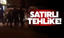 Elindeki satırla polise direndi