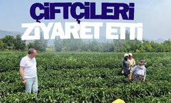 Hasat yapan çiftçileri ziyaret etti