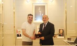 Hacıoğlu'ndan Başkan Püsküllü'ye ziyaret