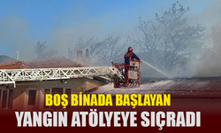 Boş binada başlayan yangın, atölyeye sıçradı