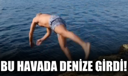 Bu havada denize girdi!