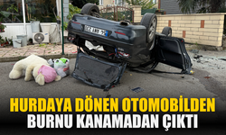 Hurdaya dönen otomobilden burnu kanamadan çıktı
