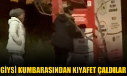 Giysi kumbarasından kıyafet çaldılar