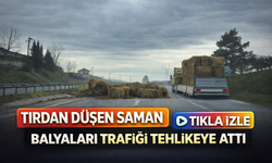 Tırdan düşen saman balyaları trafiği tehlikeye attı
