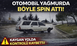 Otomobil yağmurda böyle spin attı