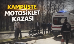 Kampüste motosiklet takla attı! sürücü refüje savruldu