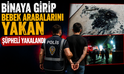 Binaya girip bebek arabalarını yakan şüpheli yakalandı