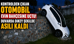 Kontrolden Çıkan Otomobil Evin Bahçesine Uçtu! Duvarda Dikey Şekilde Asılı Kaldı