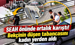 SEAH önünde ortalık karıştı! Bekçinin düşen tabancasını kadın yerden aldı