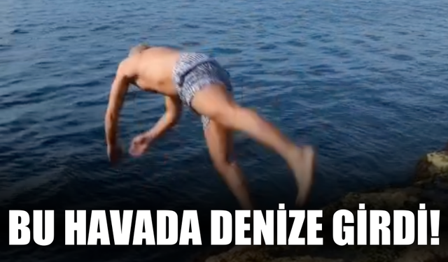Bu havada denize girdi!