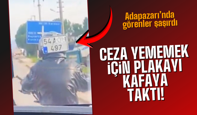 Kafasına plaka takıp trafiğe çıktı