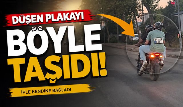 Ceza yememek için Motosiklet Plakasını Sırtına Bantladı
