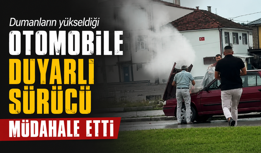 Dumanların yükseldiği otomobile duyarlı sürücü müdahale etti