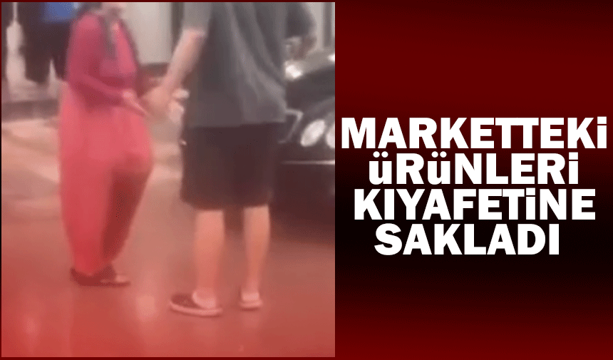 Marketteki ürünleri kıyafetine sakladı